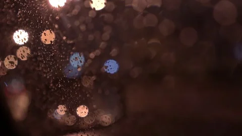View from inside the car of Rainwater drops Falling Down On the car glass Stockbeeldmateriaal 251949066
