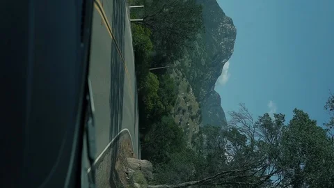 View inside the car through the windshield on beautiful countryside road with Stock Footage 92381810