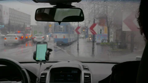 View from Inside a Car Waiting in Rainy City Traffic Stock Footage 343097899