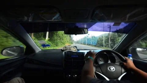 View from inside a car when driving while travelling in Thailand. Stock Footage 104038317