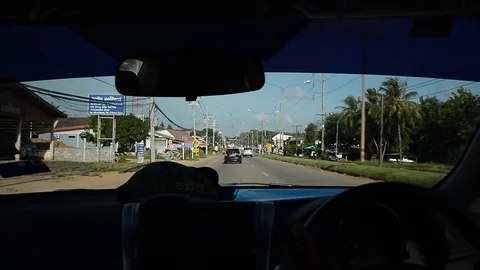 View from inside a car when driving while travelling in Thailand. 스톡 동영상 104038464