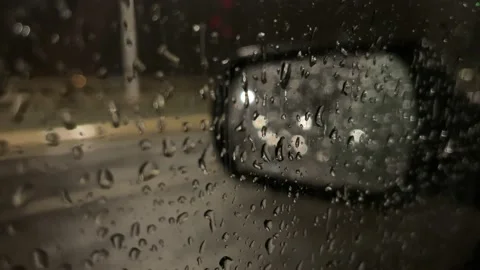 View from inside a car when a heavy rain is starting. Selective focus. Window Stock Footage 164228271