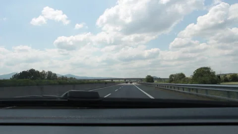 View from inside the car while driving on an Italian highway Stock Footage 131860712