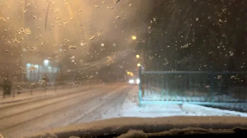 View from inside the car, wipers clear rain Stock Footage 254594497