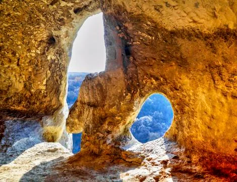 A view from inside of the cave to the outside world Stock Photos