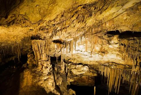 View inside of cave with stalactites Stock Photos
