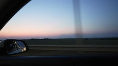 View from the Inside of Driving Car Along the Highway in the Evening at Dusk Stock Footage 205862287