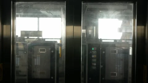 View inside elevator lift with glasses door on platform floor at skytrain s.. Stock Footage 259606619