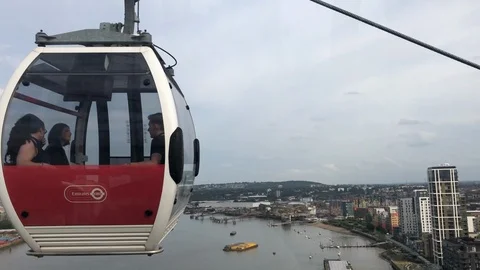 View from inside the Emirates Air Line carriage down the River Thames Stock Footage 113740764