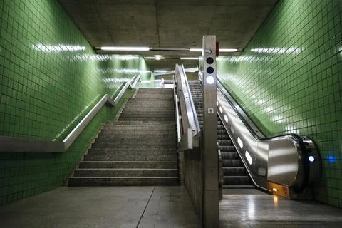 View inside an empty escalator and staircase in a subway station in Germany Stock Photos