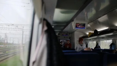 View inside of the fast train with passengers. Daylight, indoor. Stock Footage 81267338