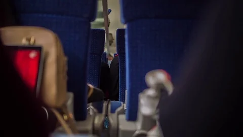 View inside of the fast train with passengers. Daylight, indoor. Stock Footage 81356859