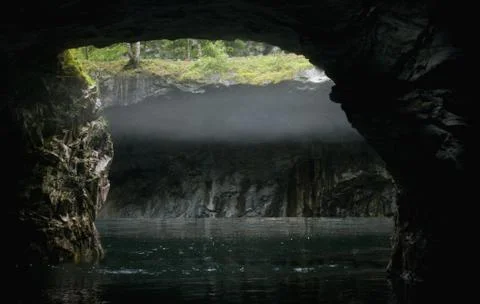 View from inside a flooded cave Stock Photos