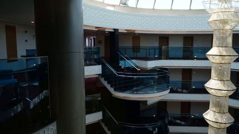 View from inside the glass elevator of a multi-storey hotel. The elevator mov Video stock 77287100
