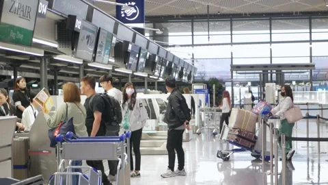 View inside haneda airport at check in counter with crowded of passenger ch.. Stock Footage 340305692