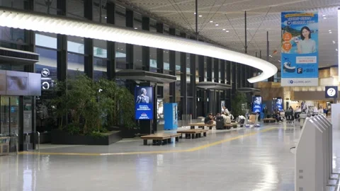View inside haneda airport at self check in kiosk and waiting area without .. Stock Footage 335583784