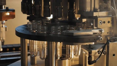 View inside industrial automated machine for blowing plastic bottles from PET Stock-Footage 109023101
