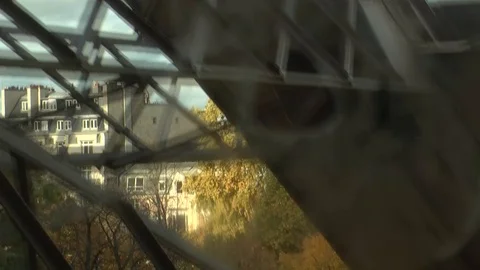View from inside the lift descending from Eiffel Tower in Paris, France 스톡 동영상 106779933