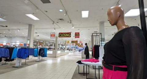 View inside a Macy's store looking past a mannequin. Fotos Stock