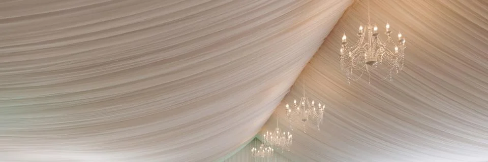 A view inside a marquee set up for a wedding reception Stock-Fotos