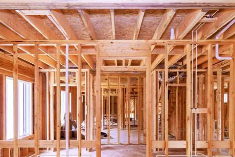 View inside a new house under construction showing incomplete wooden home Stock-Fotos