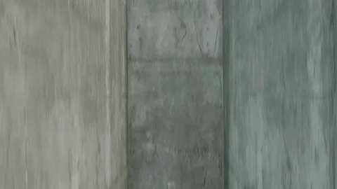 The view from inside a newly built concrete elevator shaft as it lifts up. Stock Footage 140681125