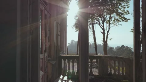View from inside old vintage abandoned building. Sun shines in old windows Stock Footage 225422212