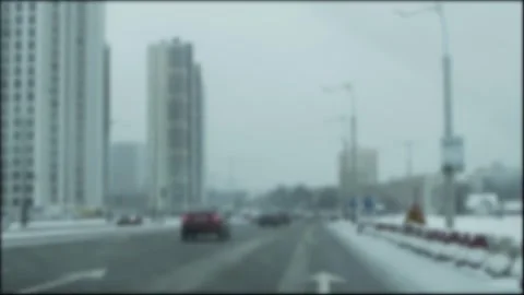 View from inside a passenger car in motion on a slippery road and traffic flow Stockbeeldmateriaal 255636620