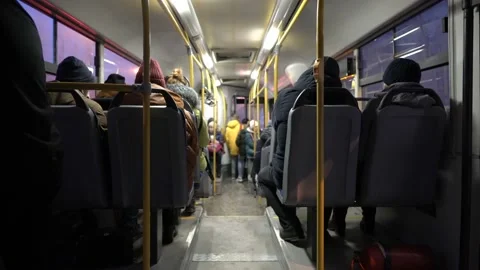 View inside the passenger compartment of the bus. The bus with people goes throu Stock Footage 124471758