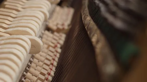 View from the inside of piano hammer, close-up. Mechanism of piano hammers beat Stock Footage