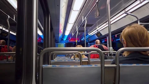 View inside a Pittsburgh train showing passengers during evening commute Stock Footage 314574855