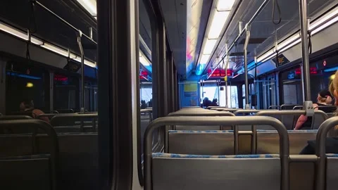 View inside a Pittsburgh train showing passengers during evening commute Video stock 314574907