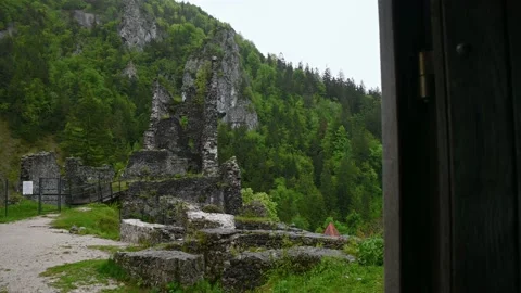 View from inside to the rain falling on ruined castle Kamen in Slovenia Stock Footage 155290112