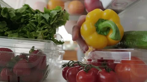 View inside the refrigerator, hand takes food from the refrigerator. Close up Stock Footage 153050514