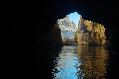 View from inside of a sea cave, a local landmark on the island of Malta Foto stock