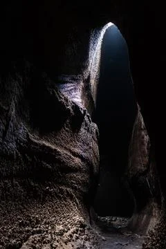 View from inside of Serracozzo volcanic cave on mount Etna, Italy Stock Photos