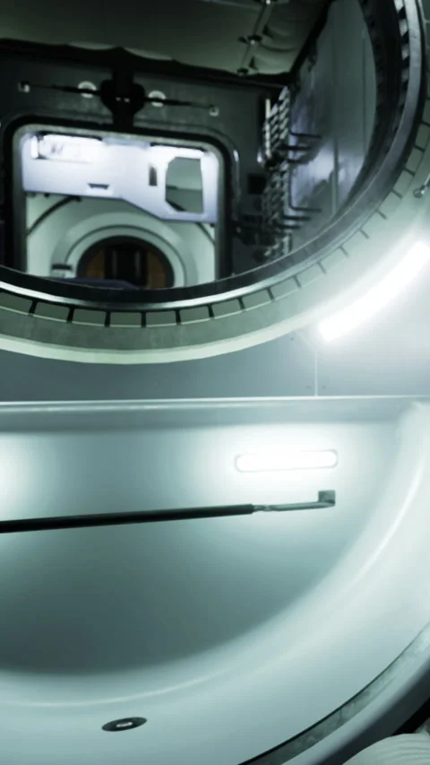 View inside a spacecraft showing a docking area with lighting and equipment Stock Footage 334172829