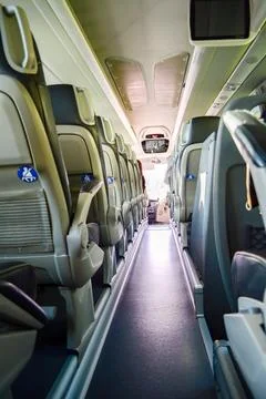 View from inside a stage coach Bus into the sunset - Bus interior trip with a Stock Photos