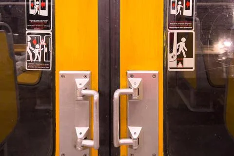 View of the inside of a subway train with the door closed in Brussels Stock Photos