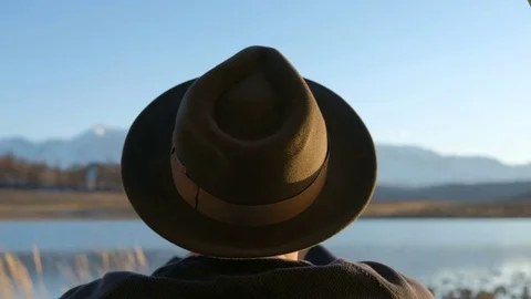 View from inside the tent. View out of the river. Young adult asian man sit Stock Footage 75788894