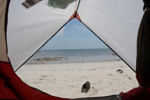 View from inside a tent on the waves and the sea in Malaysia Stock Photos