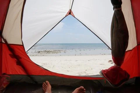 View from inside a tent on the waves and the sea in Malaysia Stock Photos