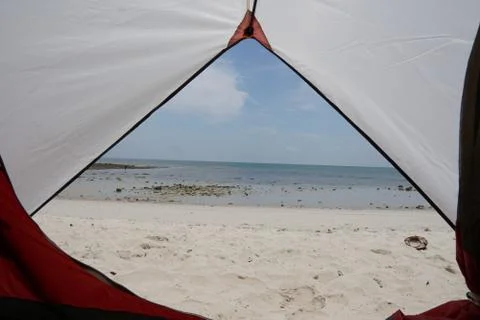 View from inside a tent on the waves and the sea in Malaysia Stock Photos