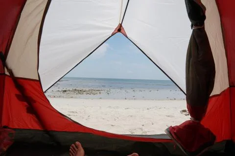 View from inside a tent on the waves and the sea in Malaysia Stock Photos