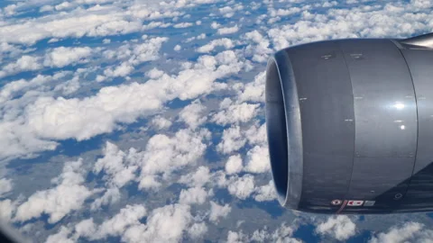 View from inside through airplane window or porthole of airplane Stock Footage 280833290