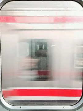 View from inside train through window with another train Foto stock