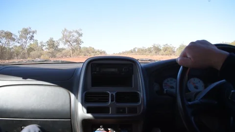 View from inside of vehicle from dirt road Stock Footage 92556176