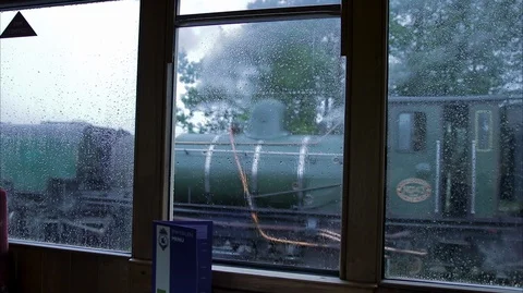 View from inside vintage steam train carriage of another train Stock Footage 128359452