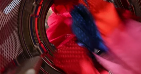 View from inside the washing machine drum. Housewife puts the Laundry capsule Stock Footage 152856919