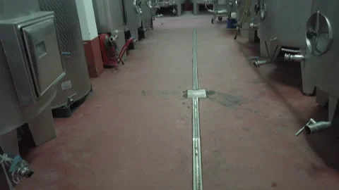 View Inside A Winemaking Factory With Rows Of Metallic Wine Fermenting Stock Footage 160087397